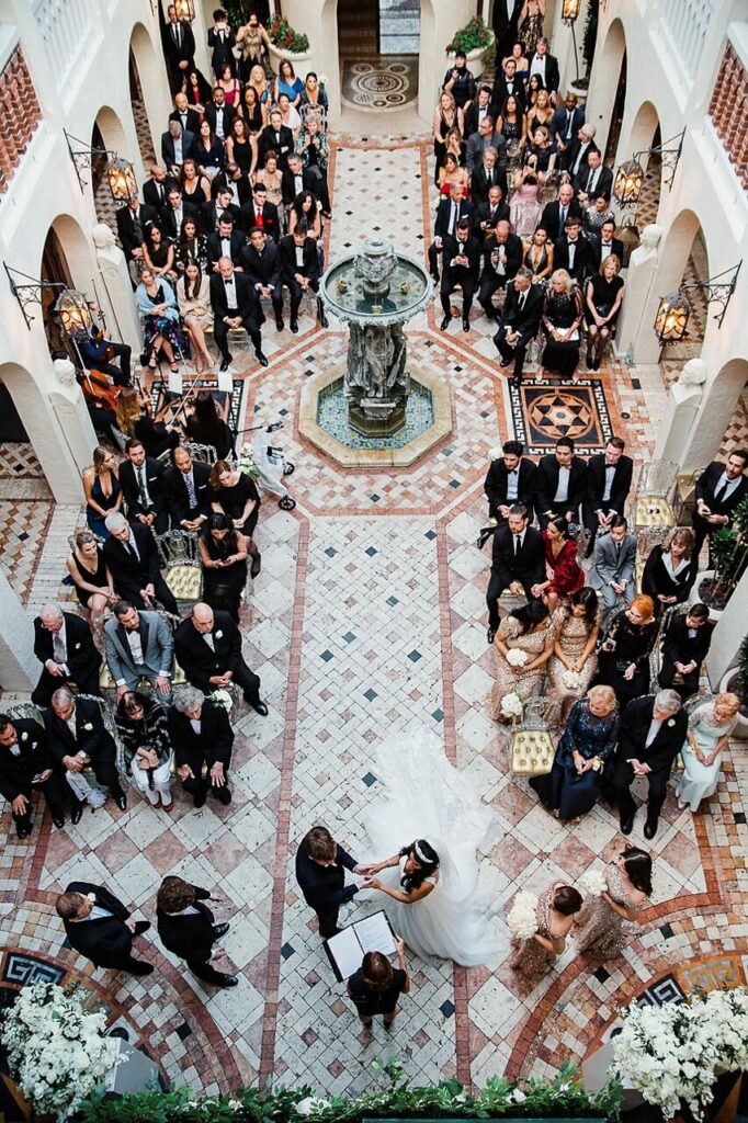 Wedding ceremony in the courtyard of Versace Mansion Photo by Jan Freire