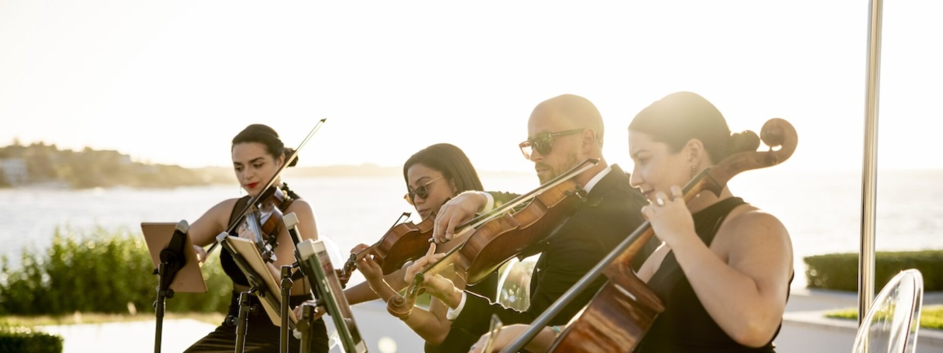 Bahamas, Aspen, Dallas, Houston wedding string quartet | Kiral Artists luxury event musicians