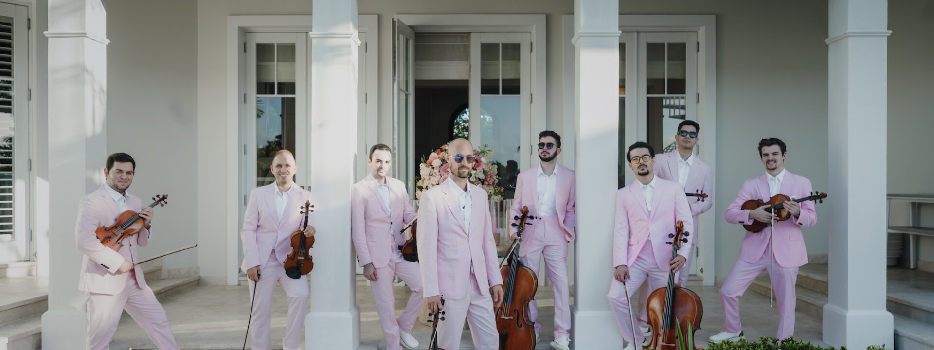 String octet - male musicians in pink suits. Bat mitzvah in South Miami